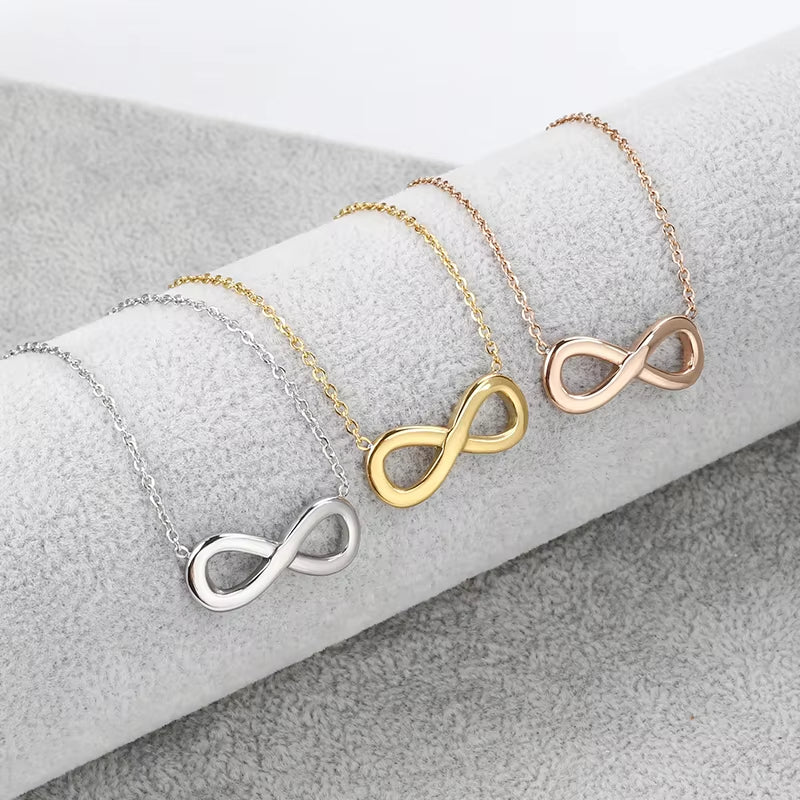 Women Wearing Stainless Steel Infinite Letter Necklace Gold Minimalist