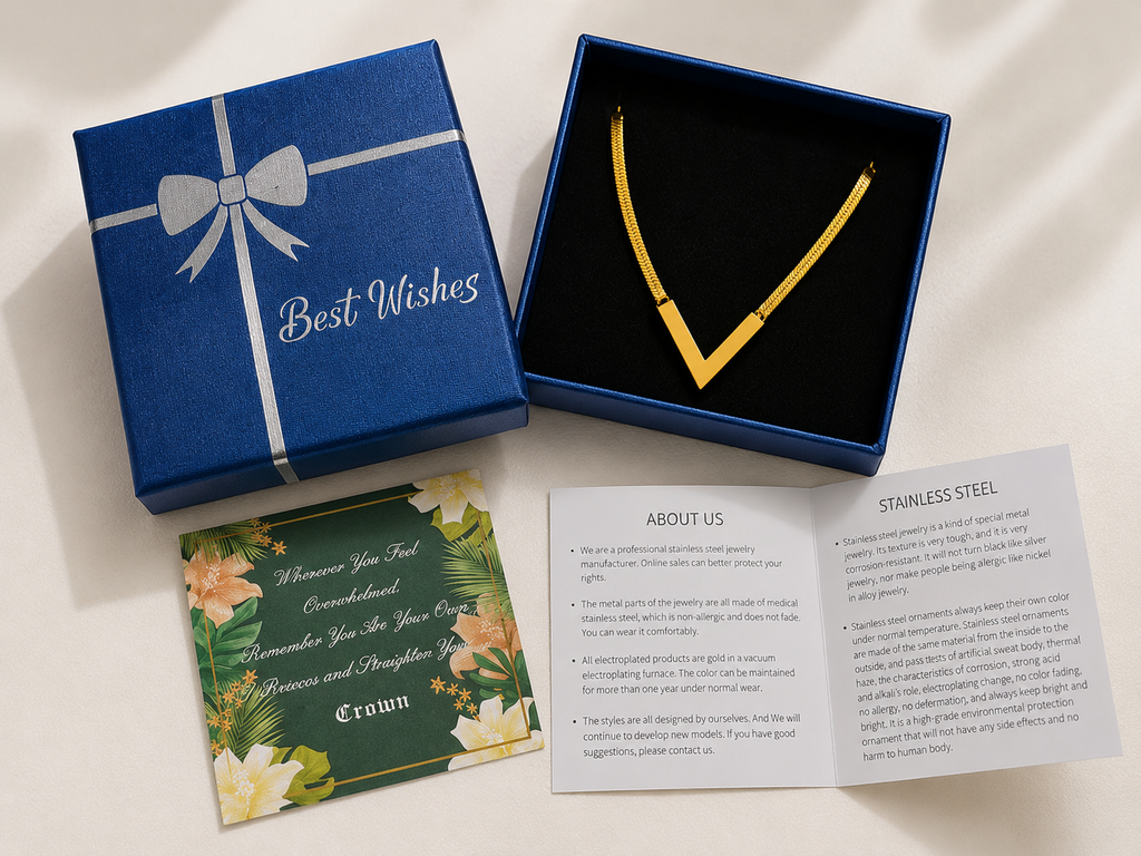 Gold V-shaped snake chain necklace displayed in elegant gift box with Best Wishes packaging and care card