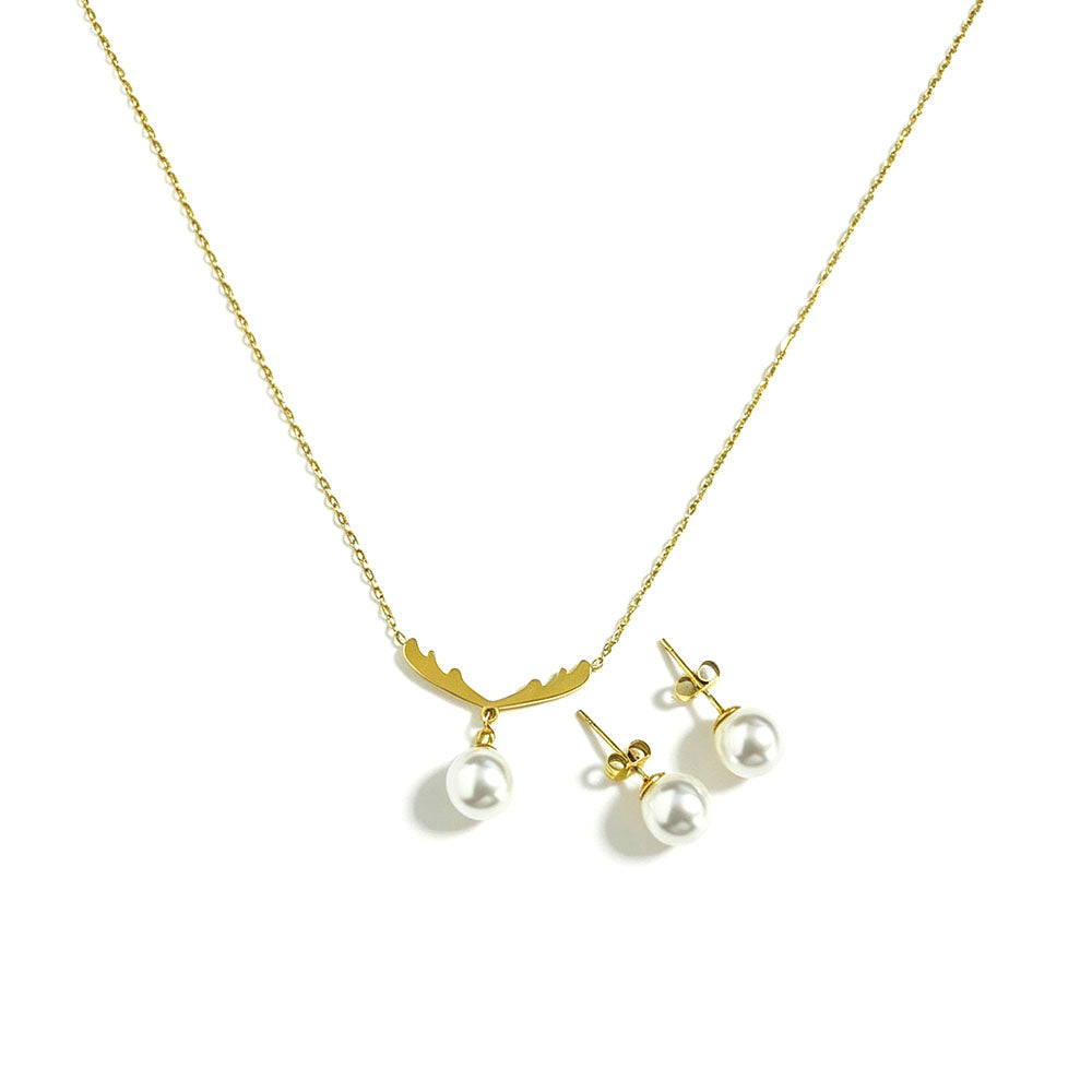 Close-up of gold antler pearl necklace and pearl stud earrings set showing fine chain and pearl detail on white background
