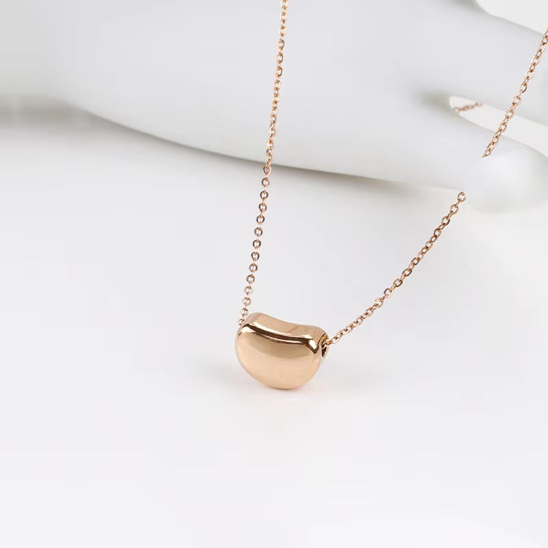Stainless Steel Fashion Pendant Necklace Close Up Detail Gold