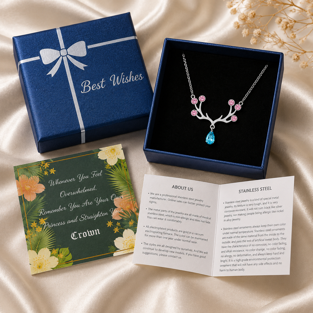 Antler crystal pendant necklace in navy blue "Best Wishes" gift box — silver stainless steel deer antler charm with pink crystals and blue teardrop gemstone, with greeting card and care booklet, perfect gift for women