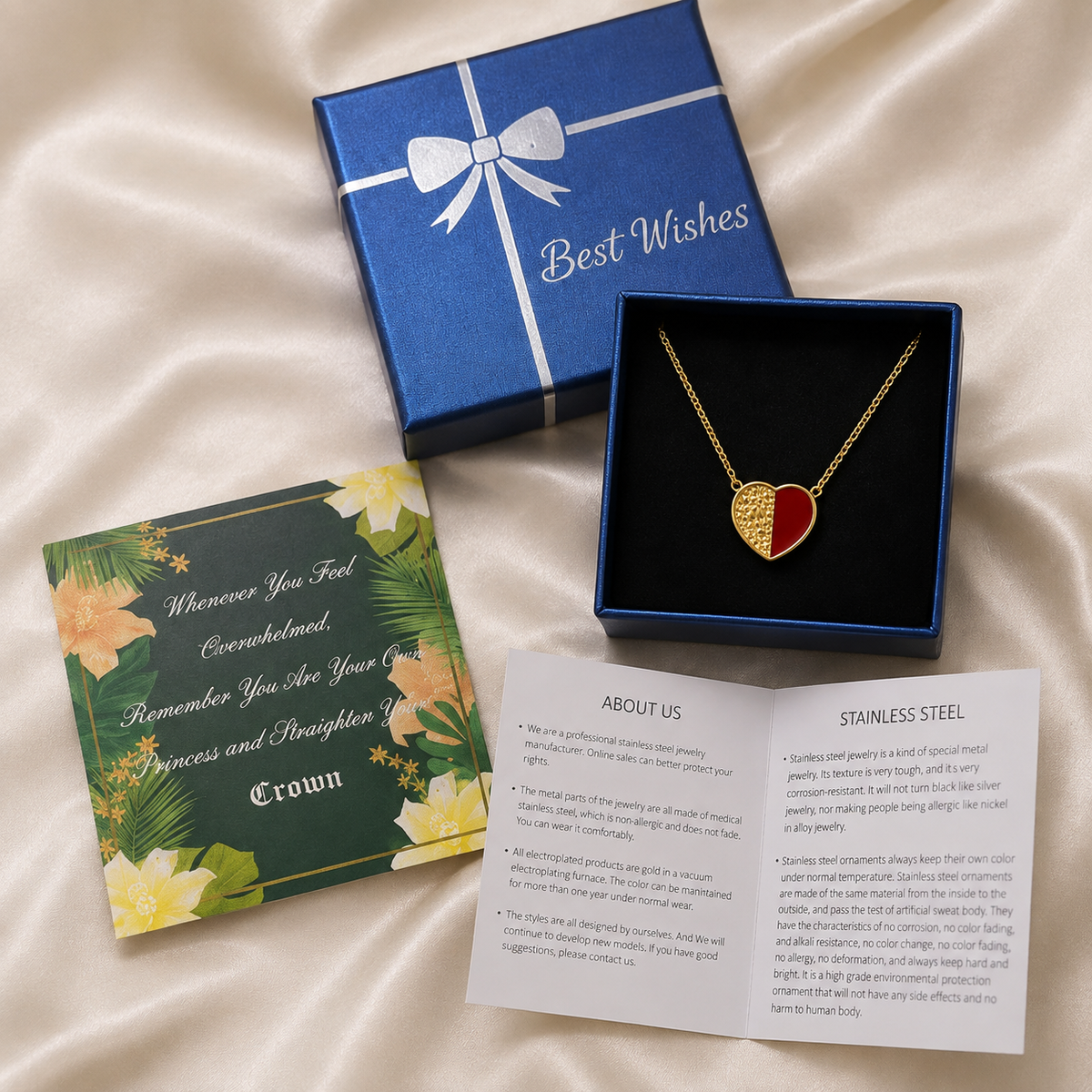 Gold and red enamel heart pendant necklace in navy blue "Best Wishes" gift box — stainless steel fashion jewelry with greeting card and care booklet, perfect gift for women
