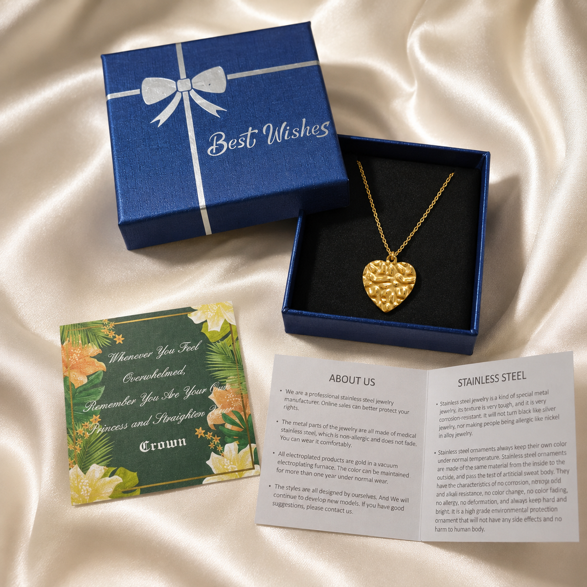 Gold PVD plated necklace gift box set with textured heart pendant in a blue box, message card, and product guide.