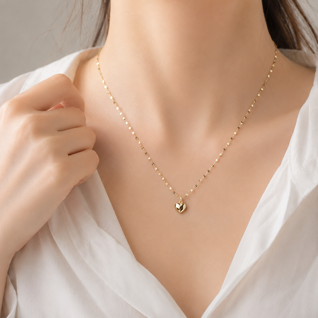 Women Wearing Bubble Heart Necklace Gold Layered Jewelry