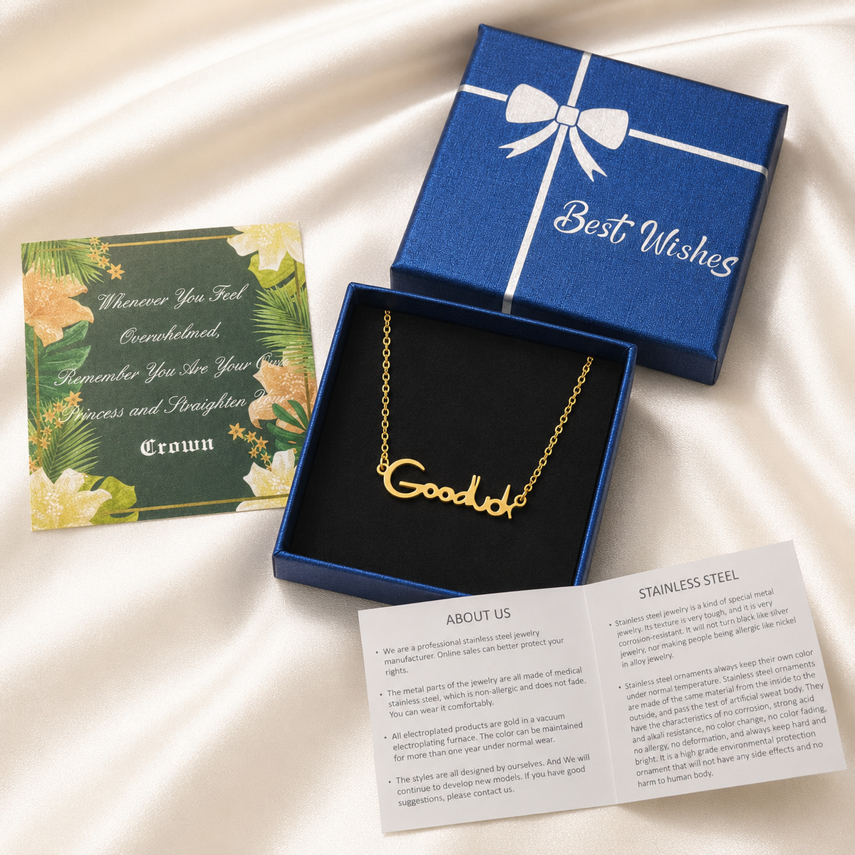 Gold name necklace gift box package with Goodluck script pendant in blue box, floral message card, and guide.