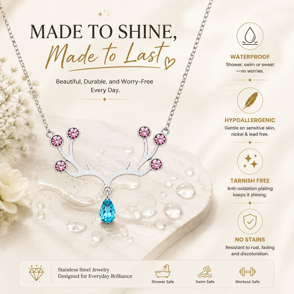 Waterproof stainless steel antler necklace with pink crystals and blue teardrop — made to shine, made to last. Waterproof, hypoallergenic, tarnish free, no stains. Shower safe, swim safe, workout safe. Beautiful, durable, and worry-free every day
