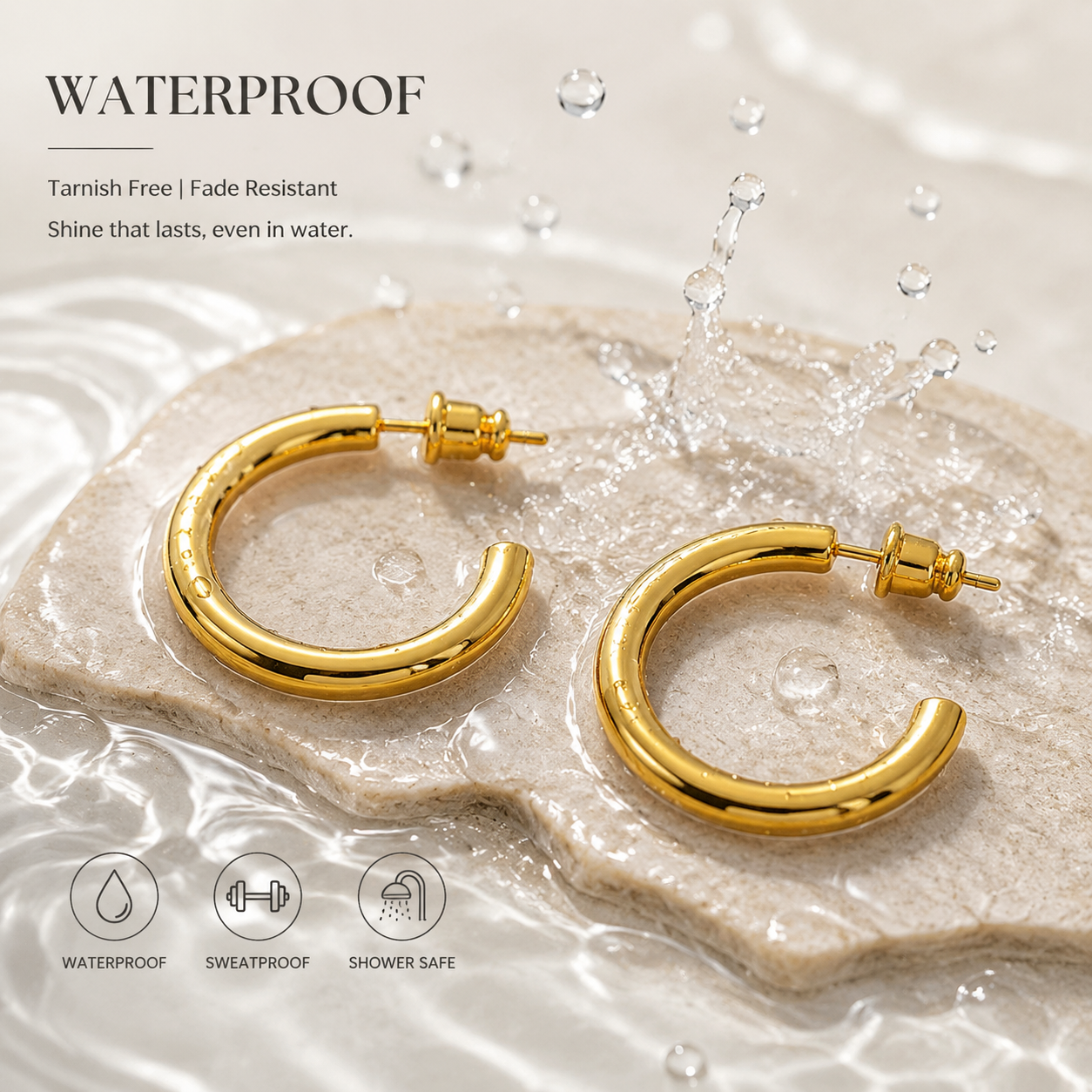 Waterproof 18K gold hoop earrings on wet stone with water splash, tarnish-free sweatproof shower-safe